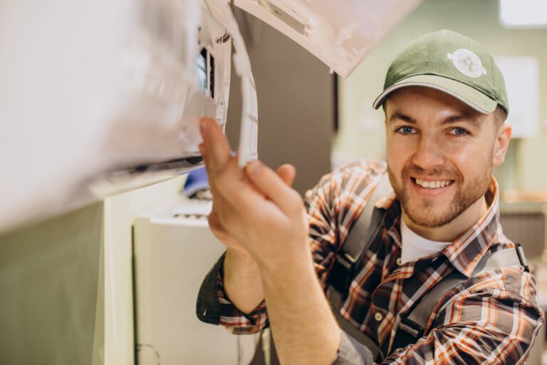 Repairman doing air conditioner servise